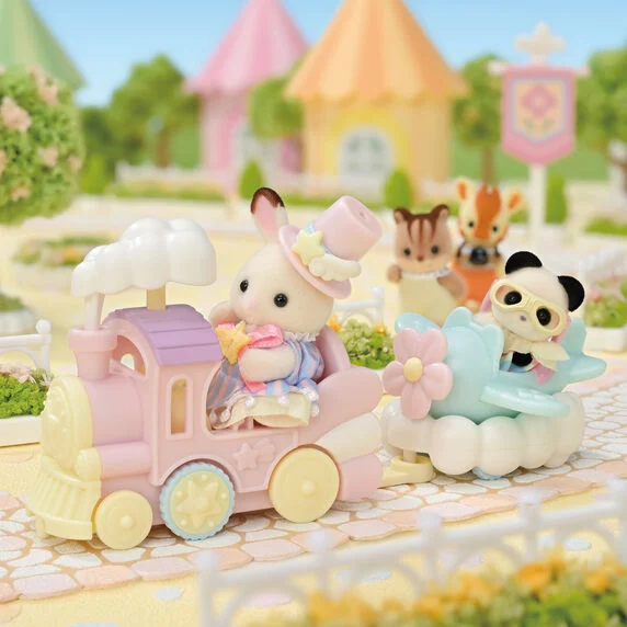 EPOCH SYLVANIAN FAMILIES CRÉME Y ERIN EN TREN Y AVIÓN